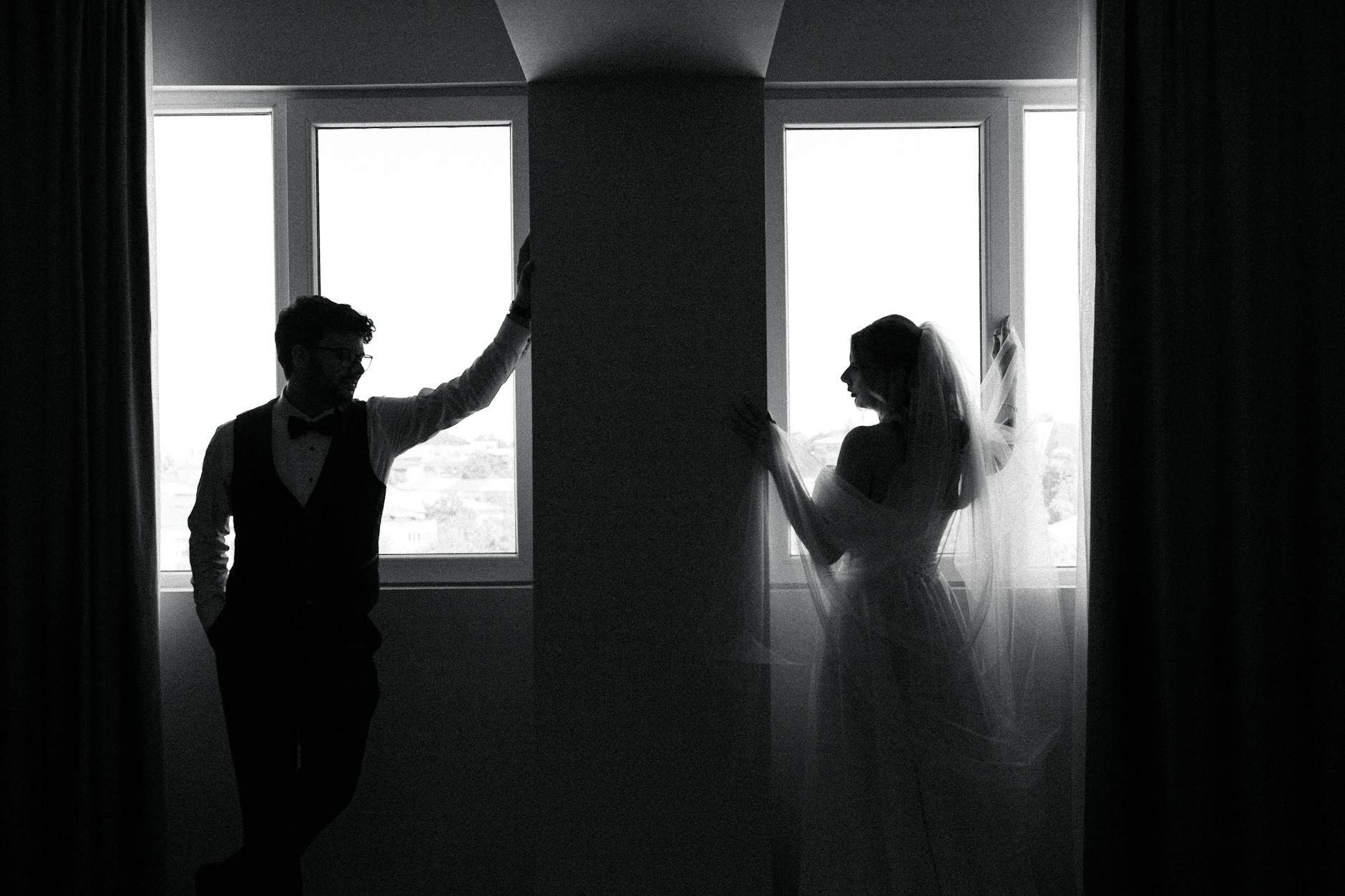 elegant silhouette wedding portrait by window